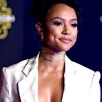 First pic of Karrueche Trans no bra under white jacket at Star Wars The Force Awakens premiere