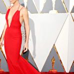 First pic of Charlize Theron in red dress at Academy Awards