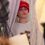 First pic of Miley Cyrus shoping in see through top in Soho