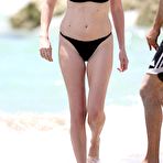 Fourth pic of Lara Stone topless during beach photoshoot
