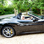 First pic of MILF Jan Burton flashes her stockings in a Ferrari