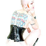 Third pic of Tattooed punk girl Jax in corset and boots impales her pierced pussy on dildo