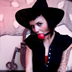 First pic of Skinny goth girl Allister in Halloween hat and gloves takes off her red bra and panties