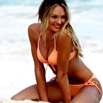 Third pic of Candice Swanepoel in pink and oramge bikinies