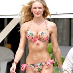 First pic of Candice Swanepoel shows deep cleavage in bikini on the beach in St Barths