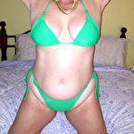 Third pic of Busty Mature Cougar Busty Bliss Poses in Green Bikini