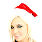 First pic of Skinny shaved teen Kacey Jordan in red christmas hat gets her tiny pussy stuffed