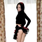 Second pic of Gothic beauty Dawn Avril naughtily plays showing her vertical smile in black panty