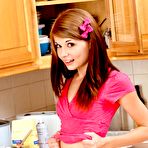 Third pic of The beautiful well shaped teen Sensi Pearl performs the exciting kitchen softcore