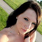 Fourth pic of Outdoor loving brunette Freckles hikes up her little dress to present a sweet ass in panties.