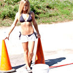 First pic of Bikini babe Meet Madden gets wet and messy outdoors while playing with a water hose.