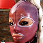 First pic of Lesbian rubber-clad dolls Black Angelica and Eve Angel have fun with each other
