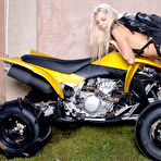 Third pic of Petite blonde cutie in boots Jana Jordan exposes her pussy on a quad bike