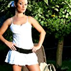 First pic of Brunette Jana Mrazkova strips her garments in the garden and masturbates wearing only leather belt.