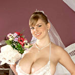 First pic of Bride Christy Marks strips out of her wedding dress