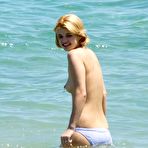 First pic of Pixie Geldof caught topless on the beach i n Ibiza