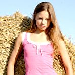 First pic of Skinny teen babe Belinda Nubiles strips her garments by the haystack and shows her tiny tits.