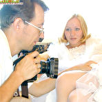 Fourth pic of Sexy blonde bride showing her pussy to a photographer and letting him lick and fuck her (preview pictures)