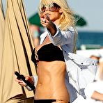Second pic of Victoria Silvstedt sexy in bikini on a beach paparazzi shots