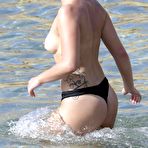 Fourth pic of Olympia Valance topless on a beach in Greece