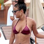 Fourth pic of Christina Milian cleavage in brown bikini