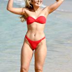 First pic of Tallia Storm sexy in red bikini on a beach