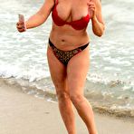 Second pic of Lisa Appleton flashes her nipples on a beach in Spain
