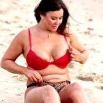Third pic of Lisa Appleton flashes her nipples on a beach in Spain