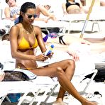 Fourth pic of Lais Ribeiro sunbathing in orange bikini