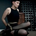 Third pic of SexPreviews - Kitty Dorian black stockings brunette is bound in lots of rope in bdsm dungeon