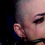 Second pic of SexPreviews - Abigail Dupree with shaved head is trapped with red ballgag in dungeon