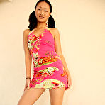 First pic of Petite pigtailed asian Evelyn Lin strips out of her short dress and gives footjob