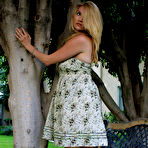 Fourth pic of Shoeless blonde Kelly Space in nice summer dress shows off her lovely feet outdoors