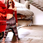 First pic of Sabina Rouge loses her flower power outfit in the hangar