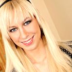 First pic of Deni Dillon - petite blonde strips in the bedroom