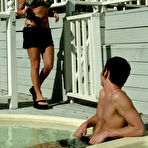 First pic of Xana Star and Mika Tan fuck Daniel at both ends with strapons at the poolside