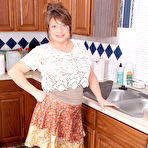First pic of [All Over 30] Penny Beavers gets herself wet on the kitchen counter - IWantMature.com