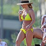 Fourth pic of Britney Spears Sexy on the beach in Hawaii in a yellow bikini - AZNude