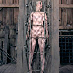 Third pic of SexPreviews - Cherry Torn kinky babe is bound in different positions in dark dungeon
