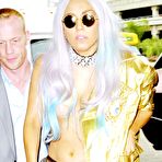 First pic of Lady Gaga in stockings and bra in airport paparazzi shots