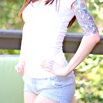 First pic of Sweet girl with red hair Ivy Jean strips out of her cute outfit outdoors and poses