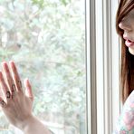 Fourth pic of Naughty inked babe Ivy Jean removes her panties and plays with her cooch by the window