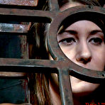First pic of SexPreviews - Trina Michaels heating up while bound in metal cage and spanked in dungeon
