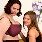 First pic of Naughty lesbian BBW having fun with a teeny babe