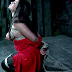 Fourth pic of SexPreviews - Dana Vixen in red dress with black pantyhose is rope bound by lezdom
