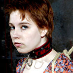 First pic of SexPreviews - Piper Hill submissive redhead is rope bound with clamps in kinky dungeon