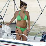 Third pic of Coleen Rooney in green bikini on a beach