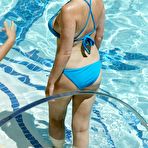 Fourth pic of Jessica Wright pokies in blue bikini in a pool