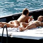 First pic of Tania Cagnotto sunbathing topless on a boat