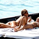 Second pic of Tania Cagnotto sunbathing topless on a boat